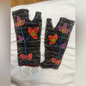 Rising International Black Fingerless Gloves with Floral Design
Boho style